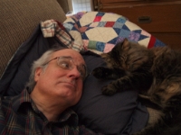 Hermes and Onjay sleep on couch P2050544